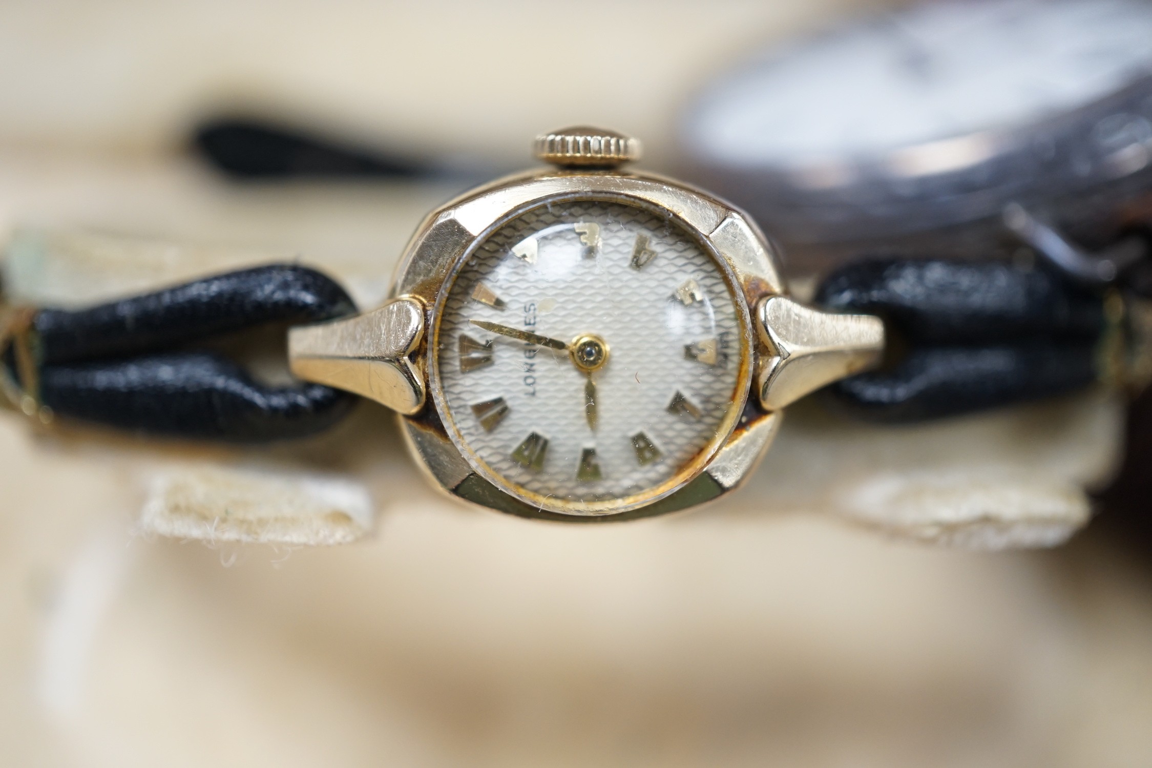A lady's 10k gold filled Longines wrist watch, original box, a gold plated fob watch and a silver watch.